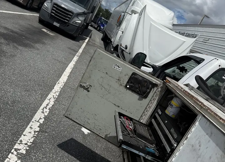 Smith Truck Repair service truck performing a mobile air-system repair in a fleet lot